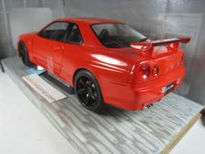 NISSAN SKYLINE GT-R R34 WITH NISMO WHEELS 1/18 SOLIDO (ACTIVE RED/BLACK)
